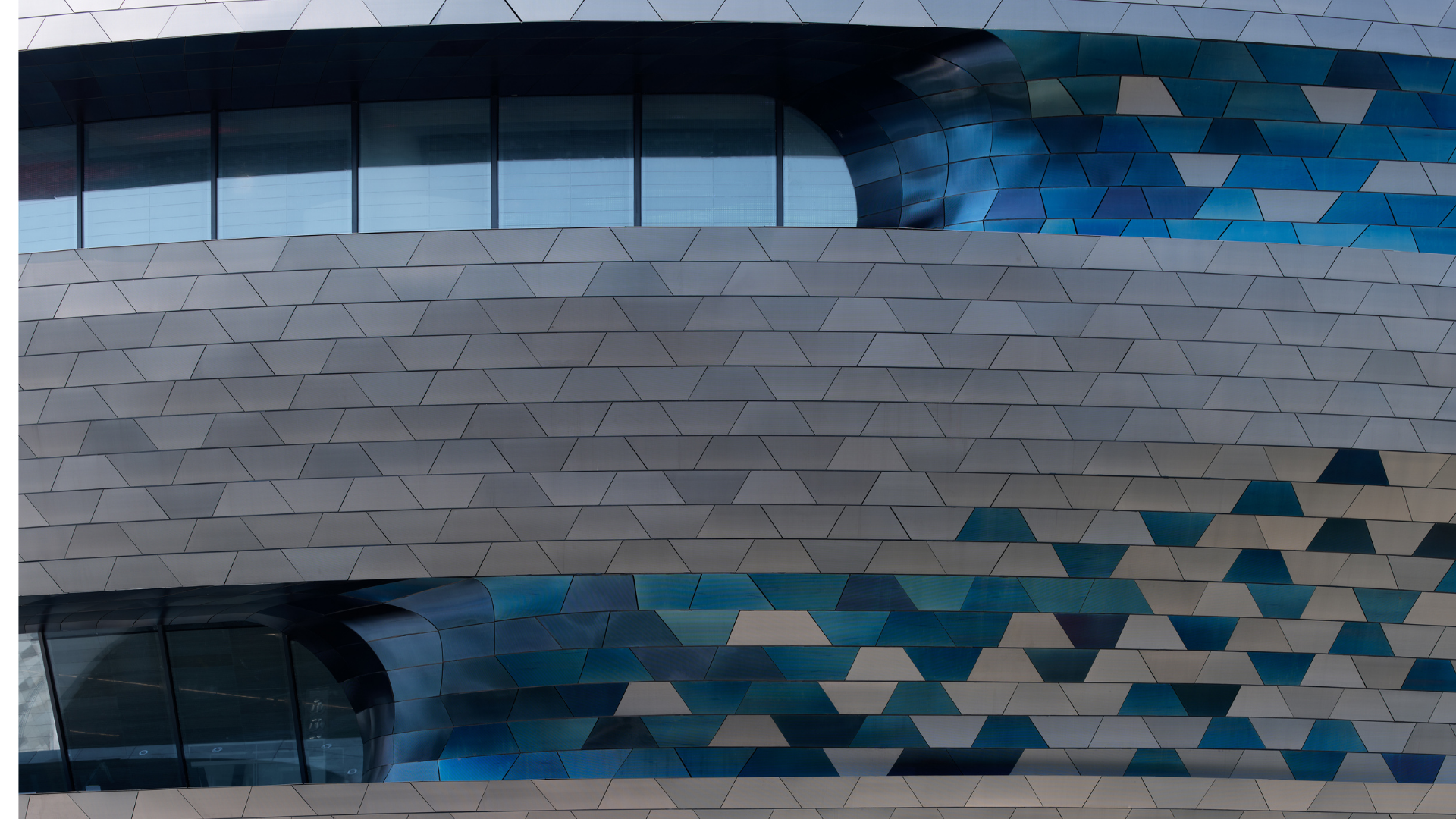 Modern atrium and curved architectural details within the interior of the Shenzhen Science & Technology Museum