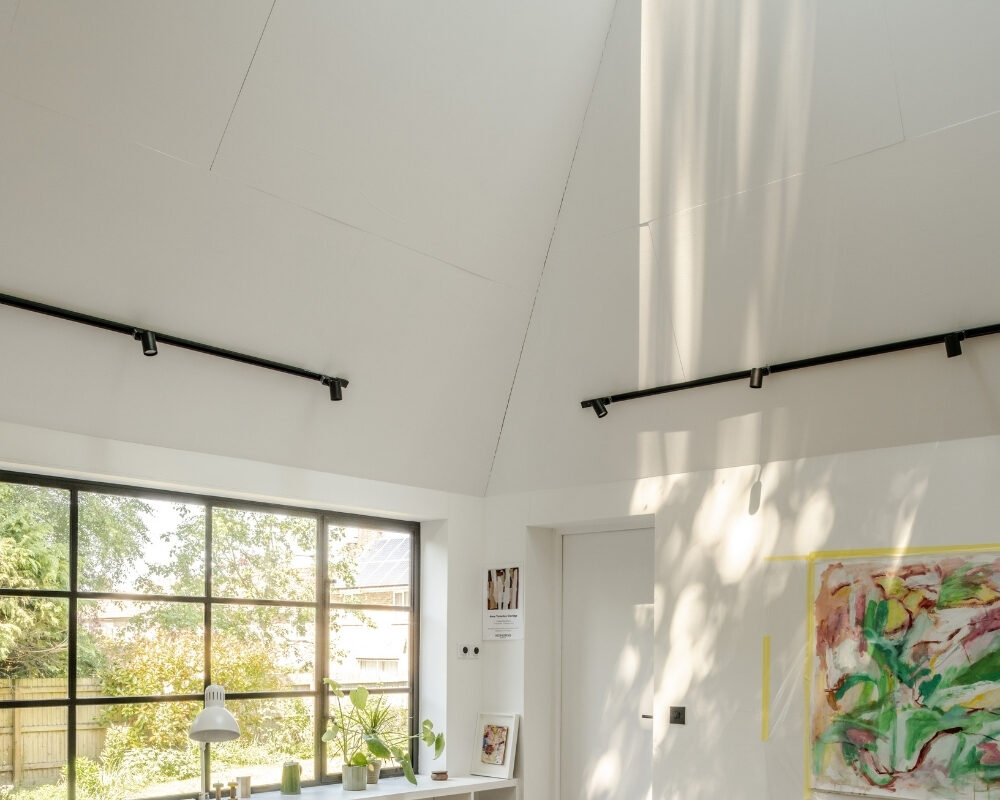 annes-art-studio-richmond-bell-architects (27) Interior of Anne’s Art Studio by Richmond Bell Architects showing the rooflight, large window and artist workspace